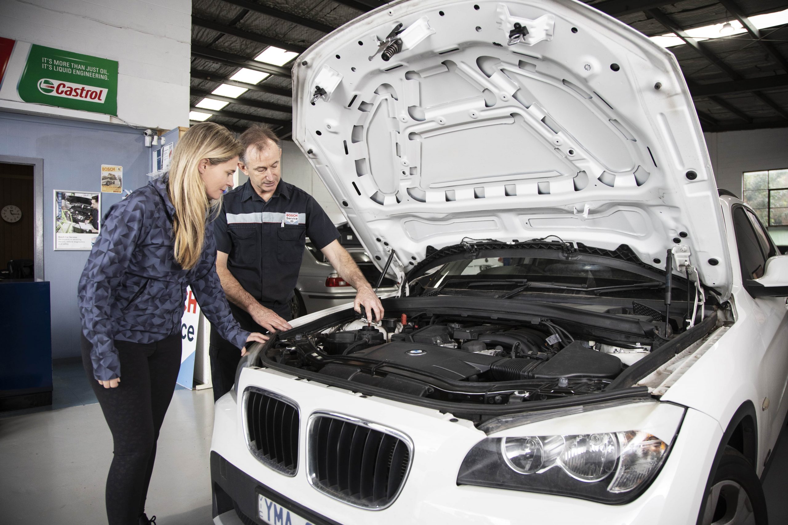 Mechanic Discussing A Car Repair In Bentleigh